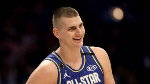 Smiling Shot Of Nikola Jokic Wallpaper