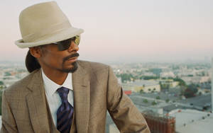 Snoop Dog Wearing Tux And Hat Wallpaper