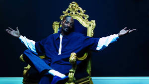 Snoop Dogg On A Throne Wallpaper