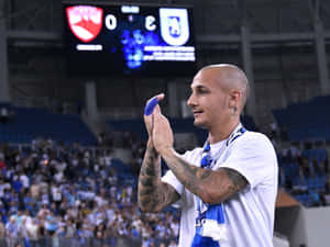 Soccer Player Applauding Crowd Stadium Wallpaper