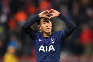 Soccer Player Celebration Heart Gesture Wallpaper