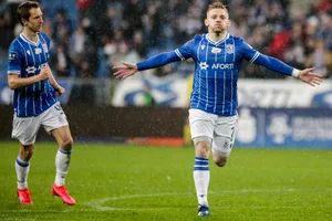 Soccer_ Player_ Celebration_in_ Rain Wallpaper