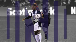 Soccer_ Player_in_ Action_ During_ Match Wallpaper