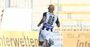 Soccer Player Mitrita Running On Field Wallpaper