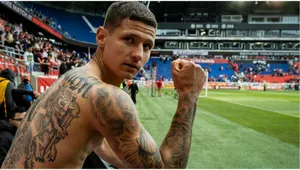 Soccer Player Showing Tattoos Stadium Background Wallpaper