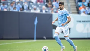 Soccer Playerin Action During Match Wallpaper