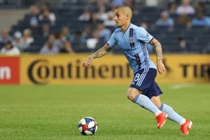 Soccer Playerin Action During Match Wallpaper