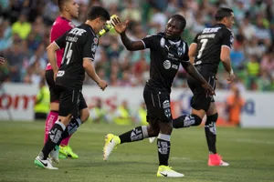 Soccer Players Celebrating On Field Wallpaper