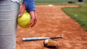 Softball Photograph On Hand Wallpaper