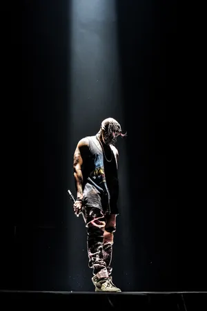 Solemn Spotlight Kanye West Android Wallpaper