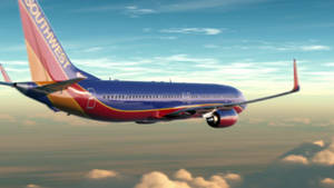 Southwest Airlines Plane Flying High Wallpaper