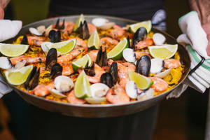 Spanish Paella With Lime Slices Wallpaper