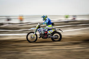 Speeding Dirtbike Wallpaper