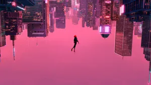 Spiderman Falling Gracefully Against A Pink Backdrop Wallpaper