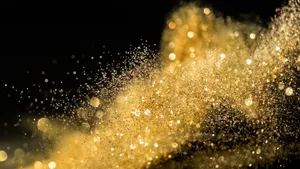 Splashing Bokeh Black And Gold Glitter Wallpaper