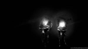 Spooky And Unsettling - Creepy Heads In Darkness Wallpaper