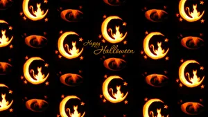 Spooky Halloween Pumpkins Glowing In The Midnight Scenes Wallpaper