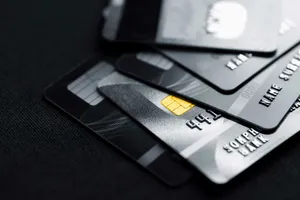 Stack Of Dark Colored Credit Cards Wallpaper