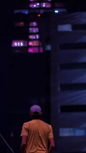 Standing Man Wearing Brown T-shirt Wallpaper