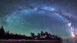 Stars Shining Brightly In The Night Sky Wallpaper