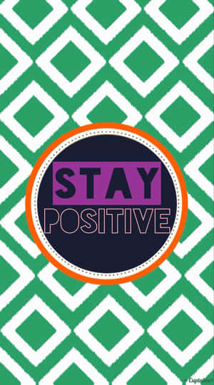 Stay Positive - A Green And Orange Pattern With The Words Stay Positive Wallpaper