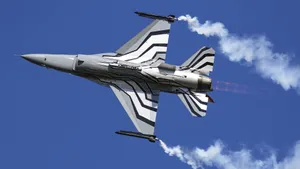 Stealthy 4k Fighter Plane Soaring Through The Sky Wallpaper