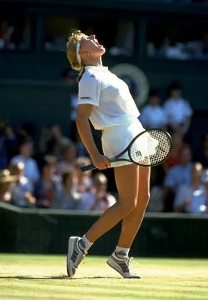 Steffi Graf Roaring In Triumph Wallpaper