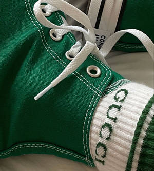 Step Into Summer With A Fresh And Colorful Pair Of Green Shoes! Wallpaper