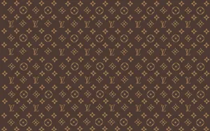 Step Into Your Own World Carrying A Louis Vuitton Bag Wallpaper