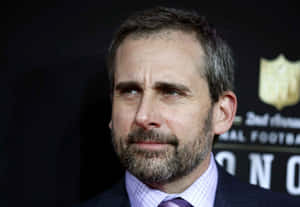 Steve Carell Charismaticly Lights Up The Screen Wallpaper