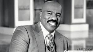 Steve Harvey Delivering A Powerful Speech On Success. Wallpaper