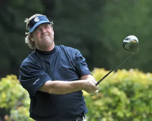 Steve Lowery Looking Up At Golf Ball Wallpaper