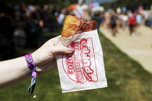 Stop By Our Kiosk At Lollapalooza For Fresh-fried Cheeseburger Puffs! Wallpaper