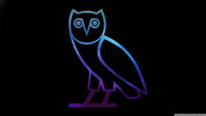 Striking Blue Ovo Logo With Drake's Signature Owl Feature Wallpaper