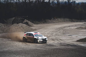 Stunning Capture Of A Skoda R5 Competing In Dirt Rally. Wallpaper