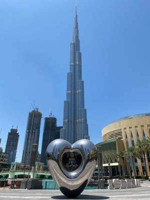 Stunning Monolithic Wonder Burj Khalifa Framed By Evening Sky Wallpaper