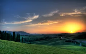 Stunning Sunset Of Hilly Tuscany Wallpaper