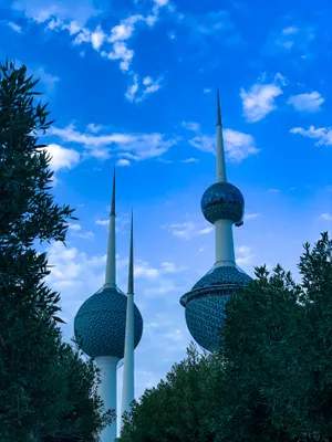 Stunning View Of Kuwait Towers Against Blue Sky Wallpaper