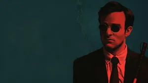 Stylish Sunglasses Reflecting A Beautiful Sunset Wallpaper