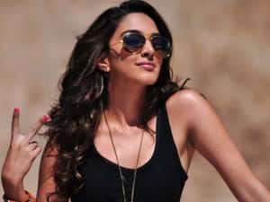 Stylish Sunglasses Reflecting The Beauty Of Nature Wallpaper