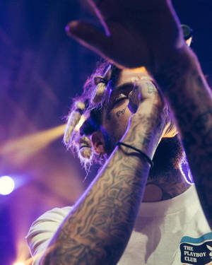 Suicideboys Scrim Performing On Stage Wallpaper