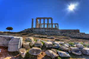 Sun In Sky Over Sounion Wallpaper