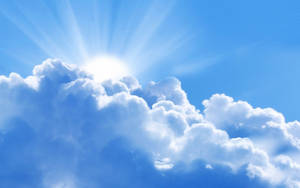 Sun Shining Through The Clouds Wallpaper