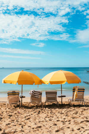 Sunny Beach Umbrellasand Chairs Wallpaper