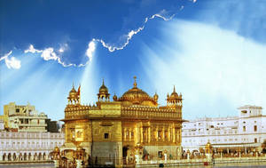 Sunrays Hitting The Golden Temple Hd Wallpaper