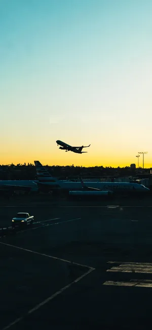 Sunset_ Takeoff_ Silhouette.jpg Wallpaper