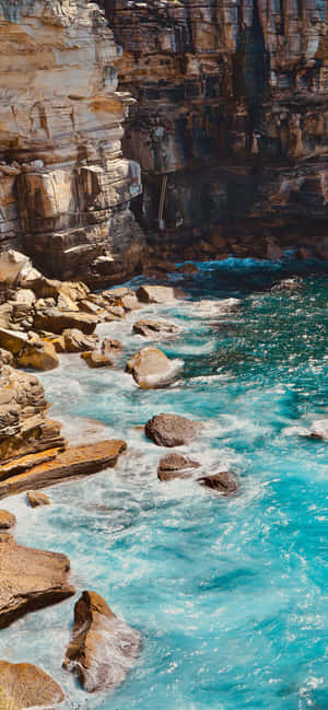 Supercharge Your Device With The Turquoise Iphone. Wallpaper