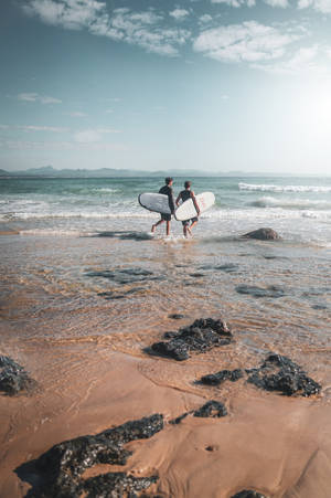 Surfers And Beach Wave Iphone Wallpaper