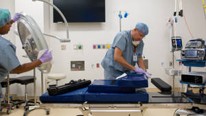 Surgeon Operating Room For Bone Surgery Wallpaper