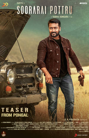 Suriya In A Reflective Mood Next To Car – Still From Soorarai Pottru Wallpaper